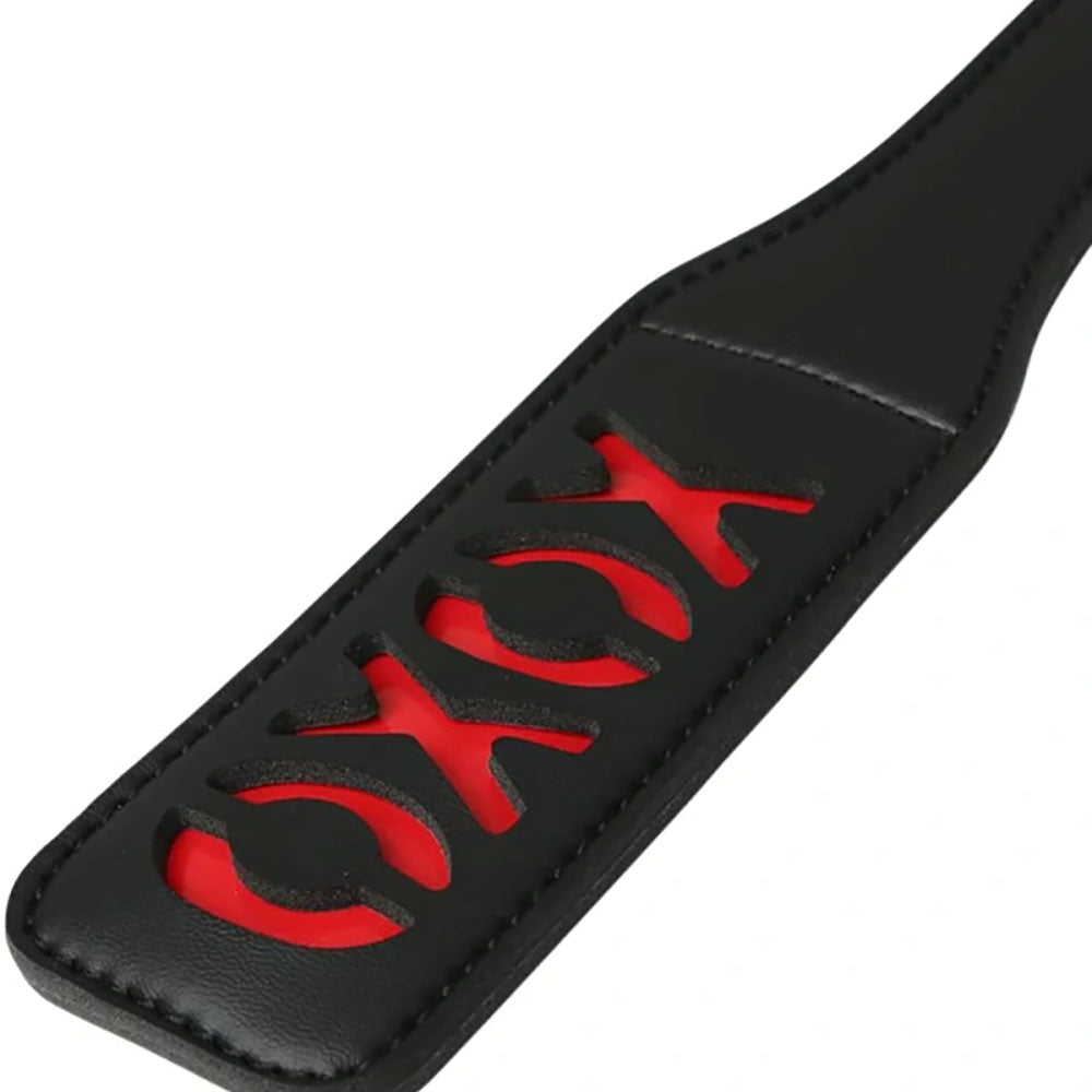 Sex & Mischief XOXO Black Vinyl Paddle with Red Cheeky Design, 30 cm Length, Includes matching Wrist Strap > Bondage Gear > Paddles